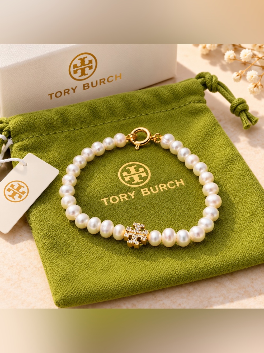 Tory Burch Pearl Bracelet with Gold Crystal Logo